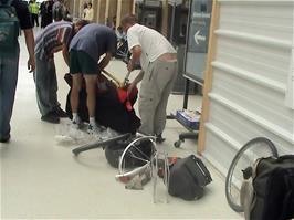 Dismantling our bikes and packing them into bags on the Nosrth station platform in Paris, ready for travelling on the 14:43 Eurostar train back to London